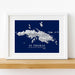 Framed map of St. Thomas, United States Virgin Islands on a white wall.