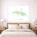 Map of St. Thomas on a wall above a bed in a bedroom setting