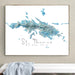 Framed map of St. Thomas, US Virgin Islands on a wall above a white bench.