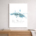 Framed map of St. Thomas, U.S. Virgin Islands on a wall above a wooden console table.