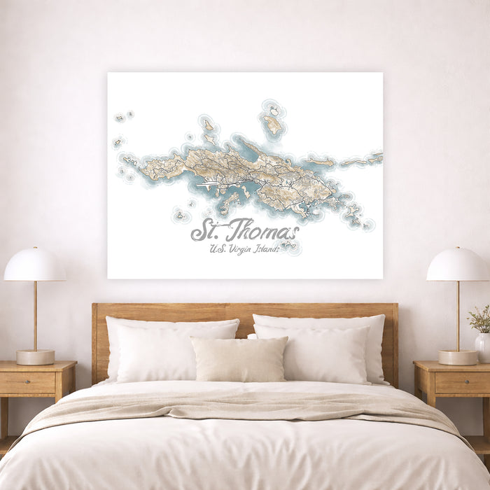Map of St. Thomas on a wall above a bed in a bedroom setting