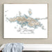 Framed map of St. Thomas, U.S. Virgin Islands on a wall above a white bench.