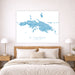 Map of St. Thomas on a wall above a bed in a bedroom setting