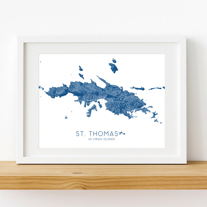 Framed map of St. Thomas, US Virgin Islands on a white wall.