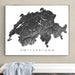 Framed map of Switzerland on a wall above a white bench.