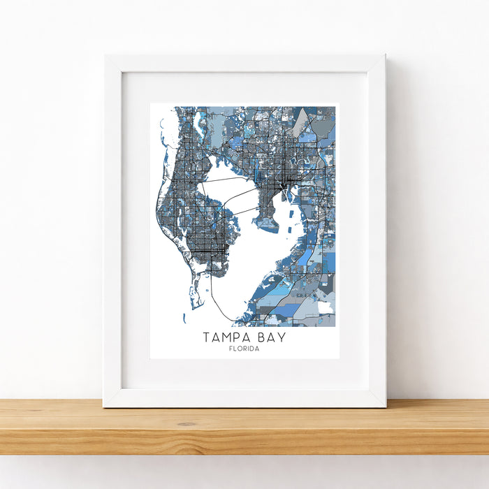 Framed map of Tampa Bay, Florida on a white wall.