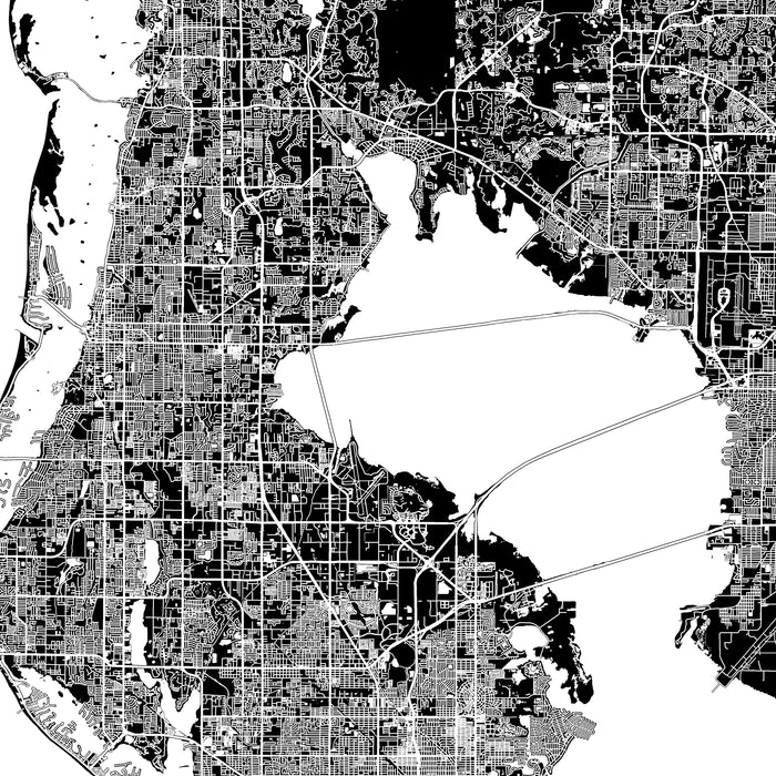 Black and white map of a city layout with roads and water bodies