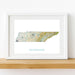 Framed map of Tennessee on a white wall
