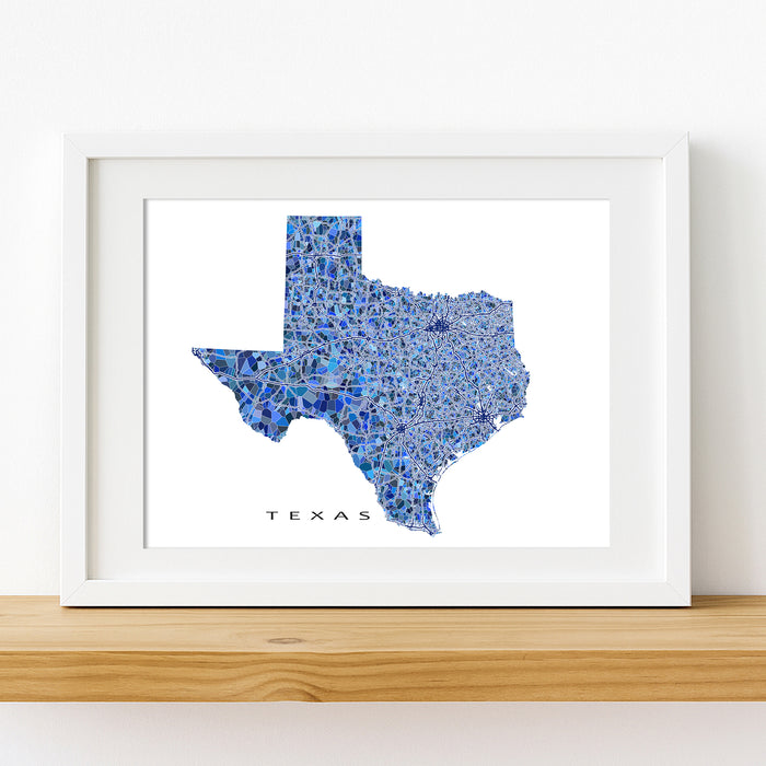 Framed map of Texas with a blue mosaic pattern on a white background