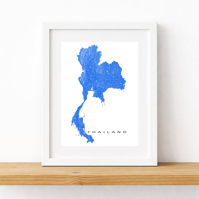 Framed map of Thailand on a white wall