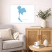 Living room with a map of Thailand on the wall, a couch, and a wooden cabinet.