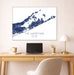 Map of The Hamptons on a wall above a desk with a laptop and lamp.