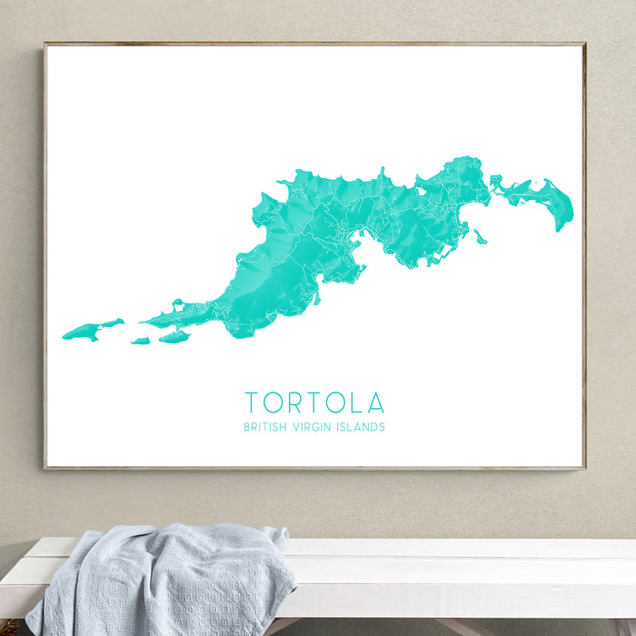 Framed map of Tortola, British Virgin Islands, in turquoise on a white background, hanging on a wall.
