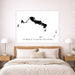 Map of Turks and Caicos Islands on a wall above a bed in a bedroom.