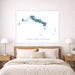 Framed map of Turks and Caicos above a bed in a bedroom setting