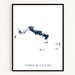 Map of Turks and Caicos Islands in a black frame on a white background