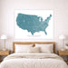 USA map wall art above a bed in a bedroom setting