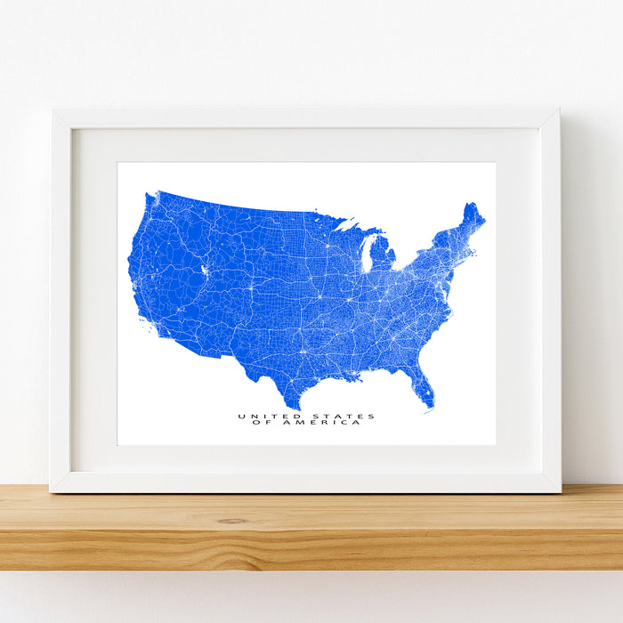 Framed map of the United States on a white wall