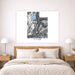 Framed artwork of Utah on a wall above a bed in a bedroom.