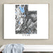 Framed map of Utah on a wall above a white bench.