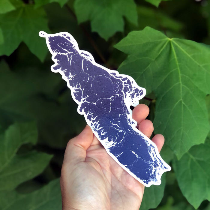Vancouver Island vinyl sticker with a navy blue topographic landscape design by Maps As Art.