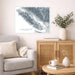 Living room with a gray sofa, wooden cabinet, and decorative items.