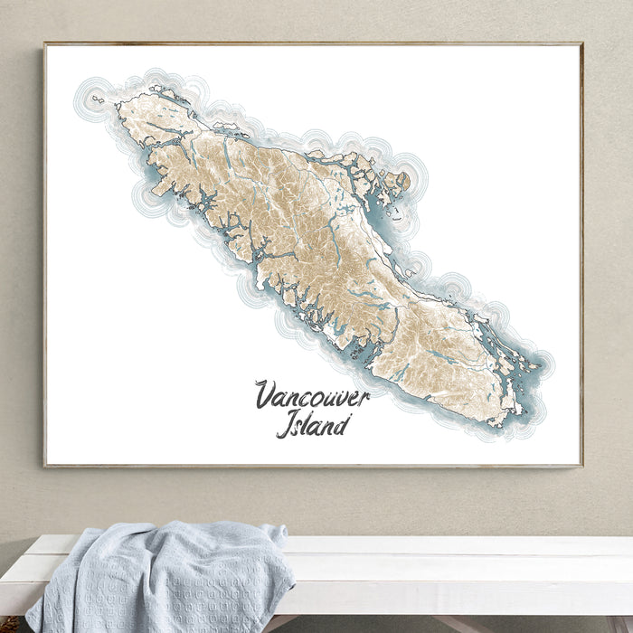 Framed map of Vancouver Island on a wall above a white surface with a gray towel.