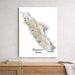 Map of Vancouver Island on a white wall above a wooden surface