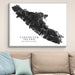 Map of Vancouver Island, British Columbia on a wall above a sofa.