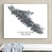 Framed map of Vancouver Island on a wall above a white bench.