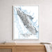Framed map of Vancouver Island, Canada on a wall above a wooden surface.
