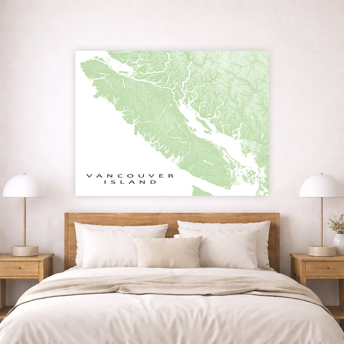 Map of Vancouver Island on a wall above a bed in a bedroom.