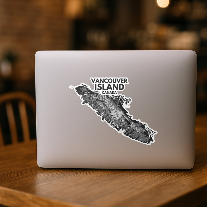 Laptop with a Vancouver Island, Canada sticker on a wooden table