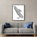 Gray sofa with blue pillows and a framed black and white map of Vancouver Island on the wall.