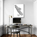 Modern office setup with a desk, chair, and framed map of Vancouver Island on the wall.