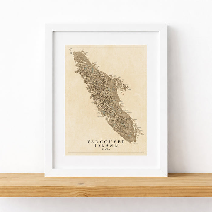 Framed map of Vancouver Island on a white surface