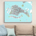 Framed map of Venice on a wall above a beige sofa with light blue cushions.