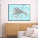 Framed map of Venice on a wall above a wooden cabinet and sofa.