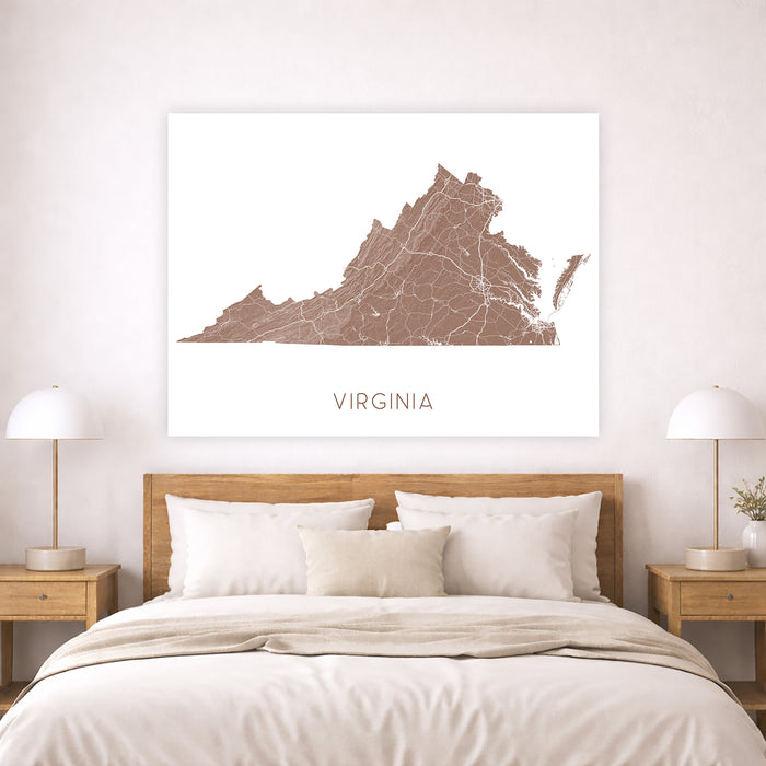 Bedroom with a map of Virginia on the wall above a bed.
