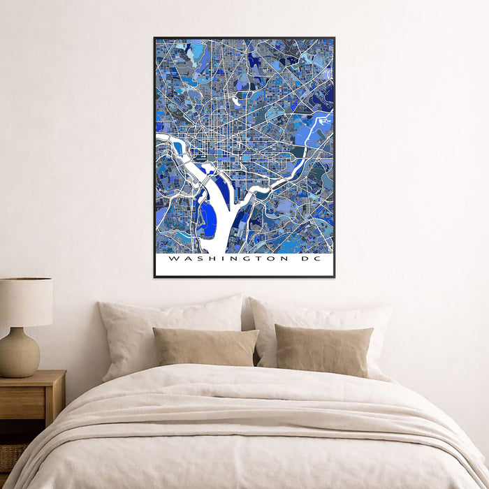 Framed map of Washington DC on a wall above a bed
