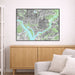 Framed city map of Washington DC on a wall above a wooden cabinet.