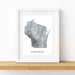 Framed map of Wisconsin on a white background
