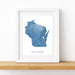 Framed map of Wisconsin on a white wall