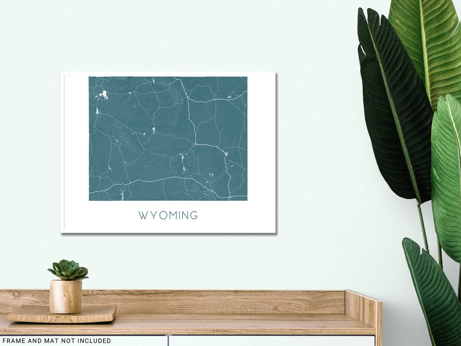 Wyoming state map print with a 3D topographic landscape design by Maps As Art.