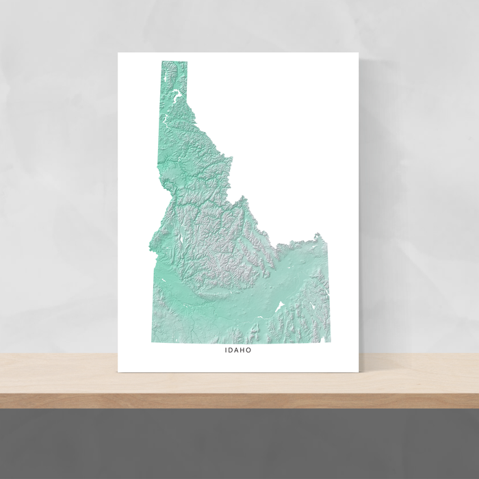 Idaho state map print with natural landscape in aqua tints designed by Maps As Art.