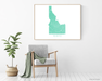 Idaho state map print with chair and plant home decor by Maps As Art.