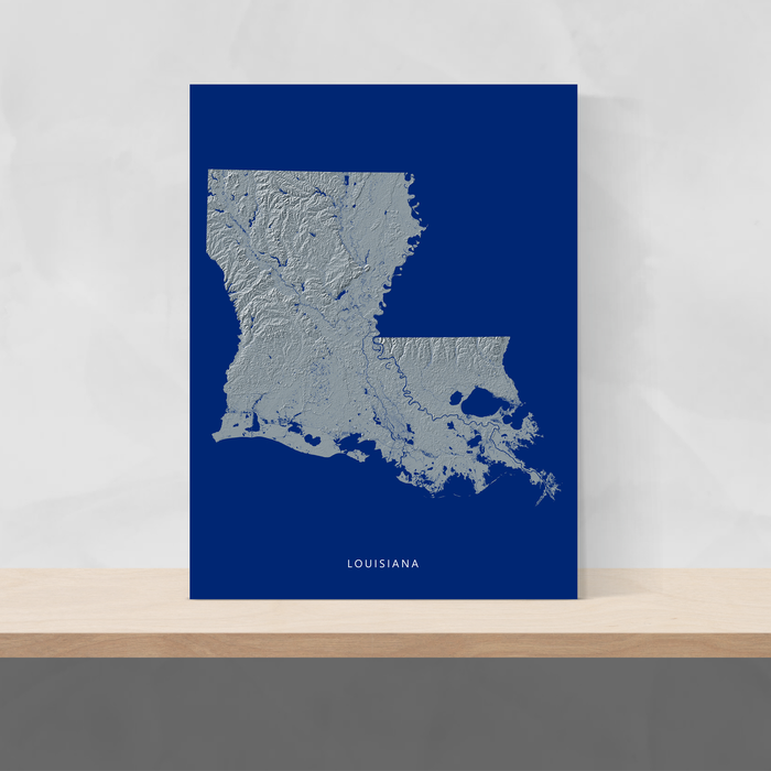 Louisiana state map print with natural landscape in greyscale and a navy blue background designed by Maps As Art.
