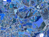 Manchester, England map art print in blue shapes designed by Maps As Art.