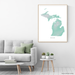 Michigan state map print with natural landscape in aqua tints designed by Maps As Art.