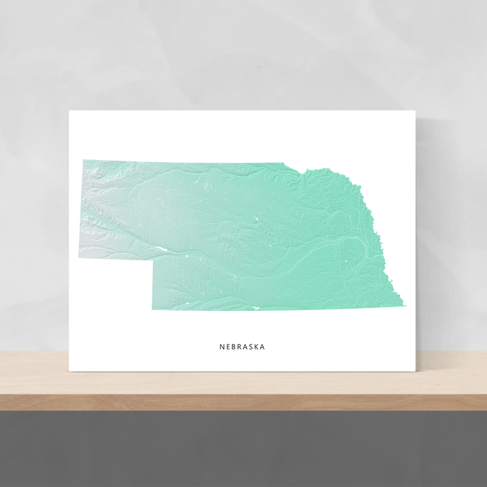 Nebraska state map print with natural landscape in aqua tints designed by Maps As Art.